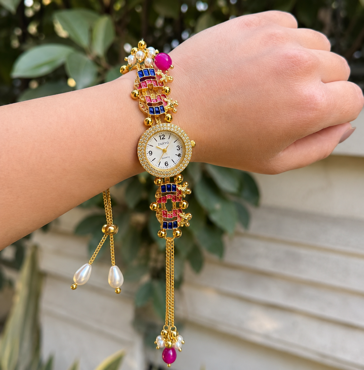 Women’s Gold-Tone Elephant Motif Bracelet Watch with Decorative Chains